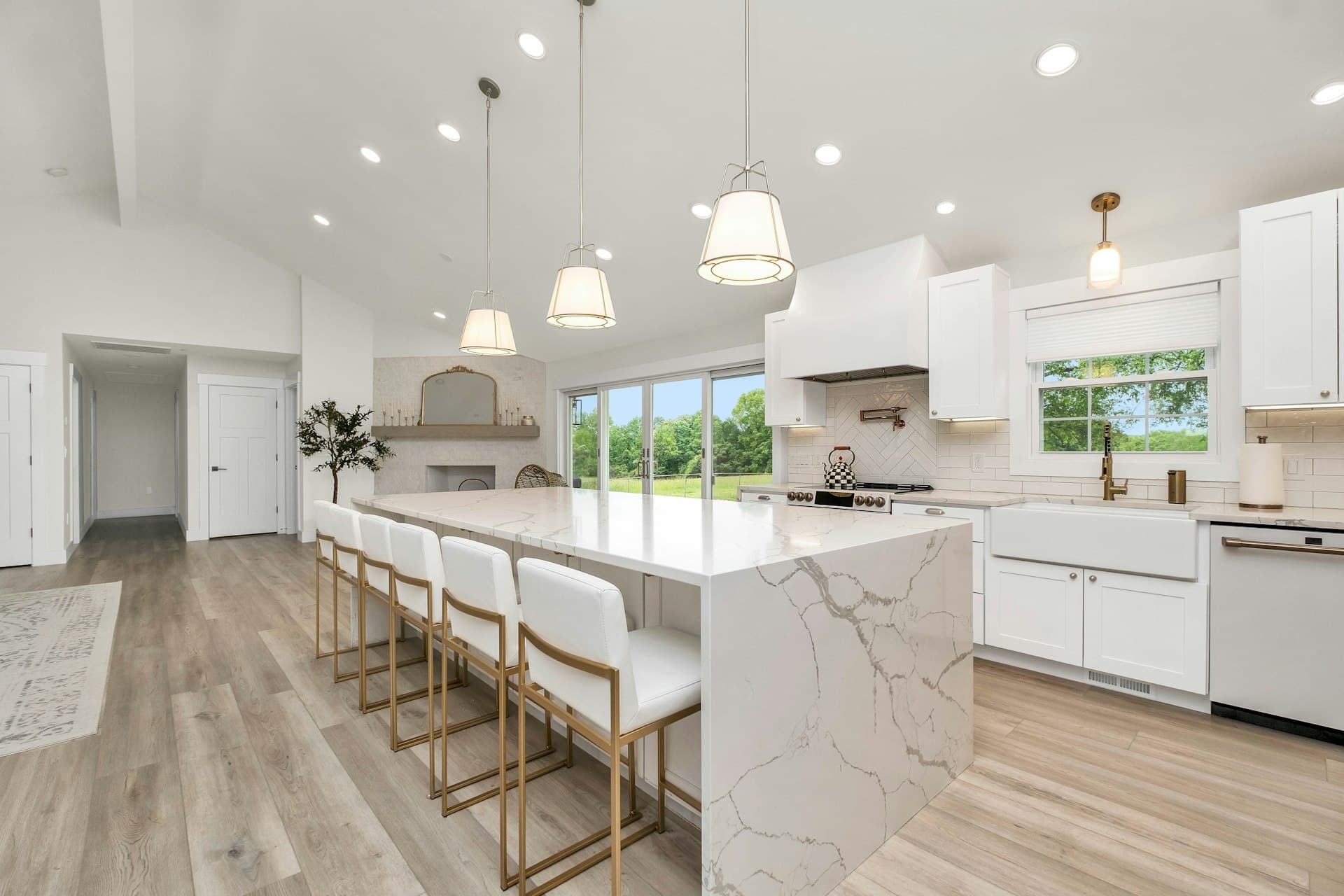 High-end kitchen with marble island and custom cabinetry